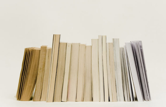 A progressive chart of discolored pages, from cinnamon to glacier white.