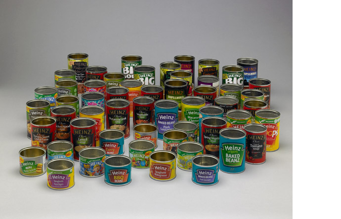 A collection of empty Heinz cans create a psychedelic still life.