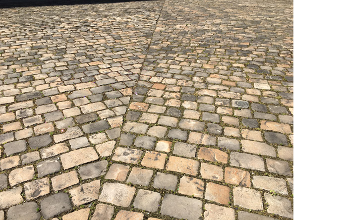 3/5 -- Cobblestones are symbolic artefacts, building blocks of the myth of the barricades.